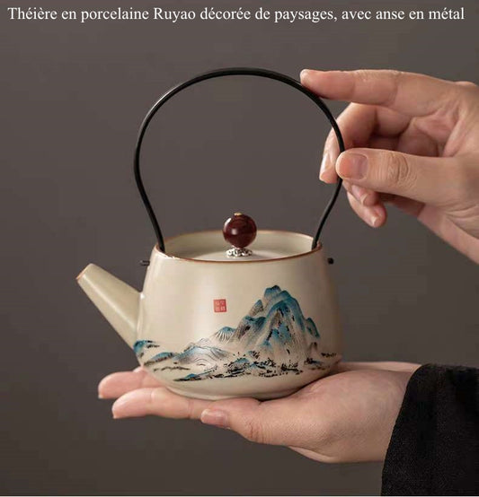 Théière en porcelaine Ruyao décorée de paysages avec anse en métal