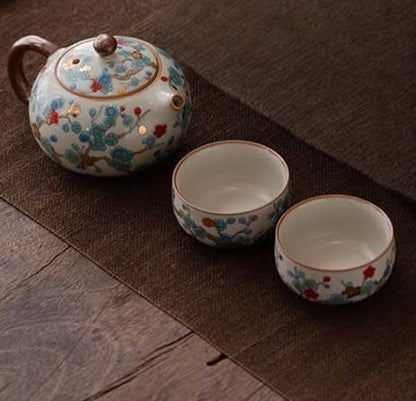 Théière en porcelaine Ruyao Fleur de prunier dorée avec deux tasses